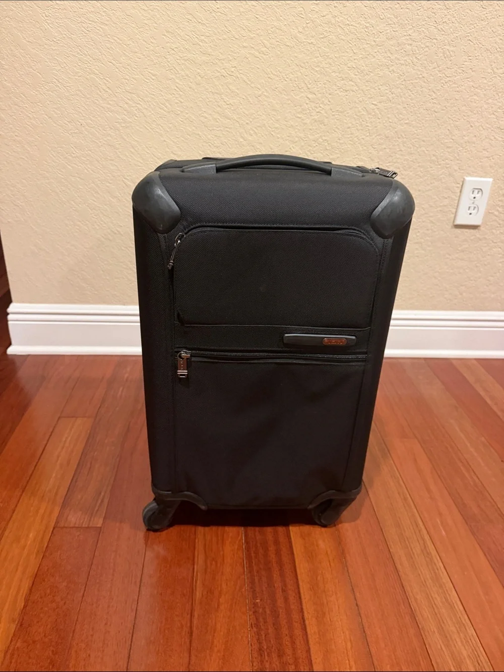 Tumi Black Upright Carry-On with Front Pocket